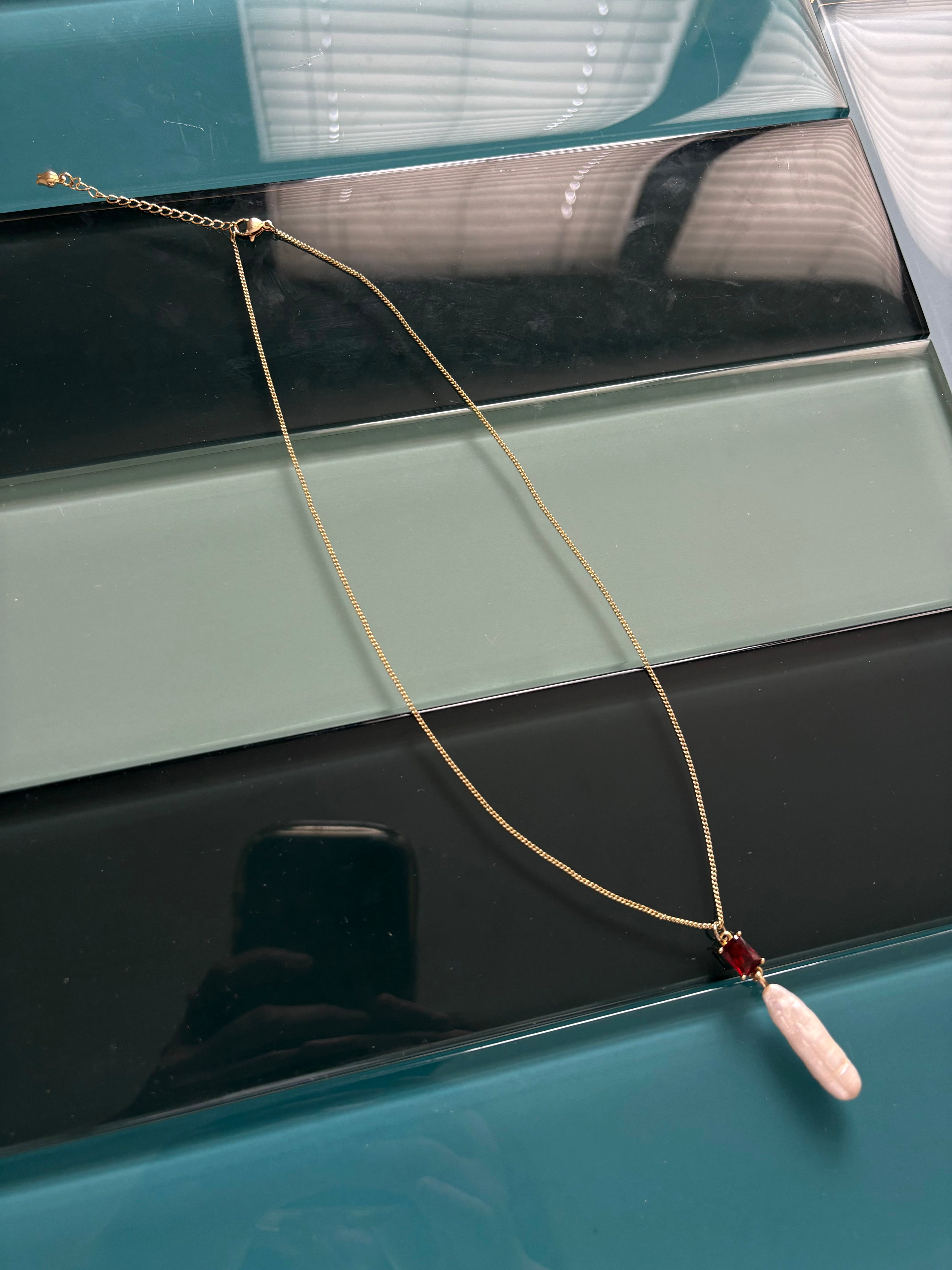sirens garnet necklace