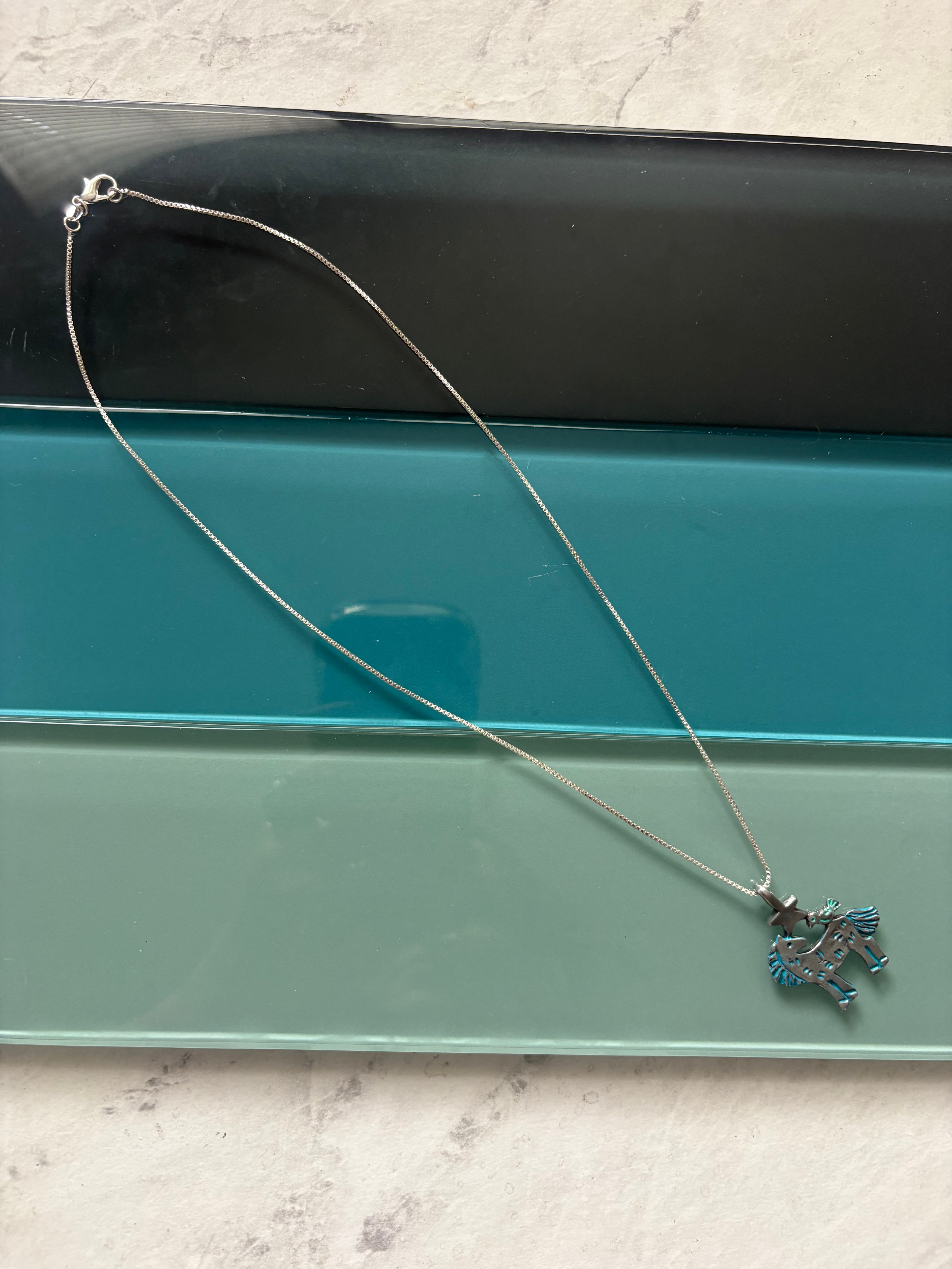 moonlight mustang necklace