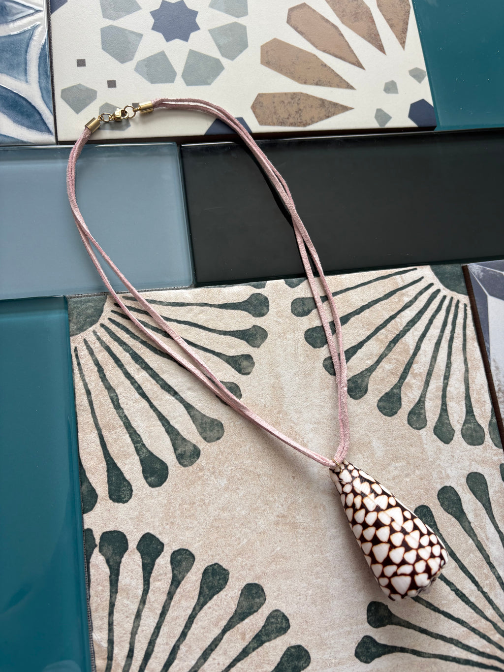 cone shell caviar necklace