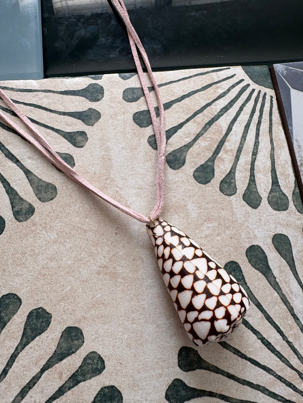 cone shell caviar necklace