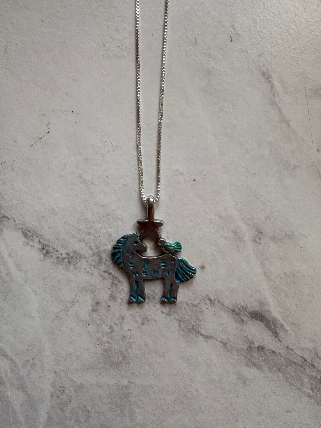 moonlight mustang necklace