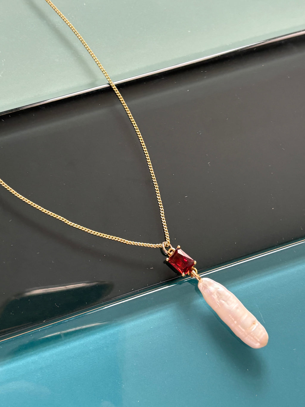 sirens garnet necklace