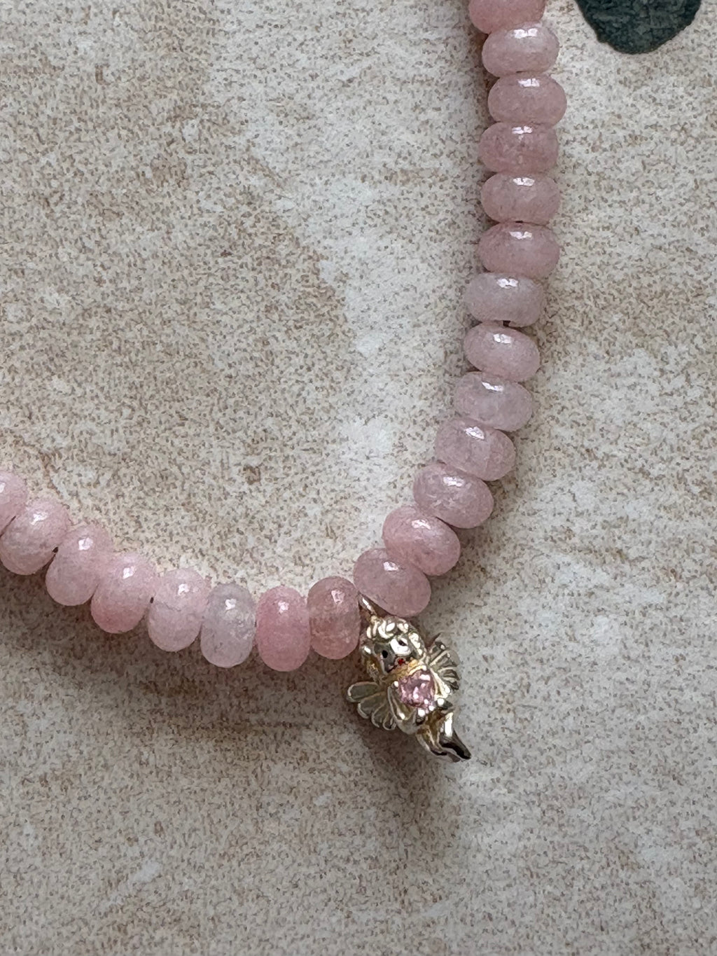saltwater cherub necklace